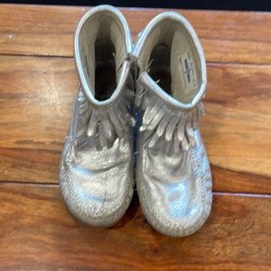 Minnetonka shoes- silver with zippers.